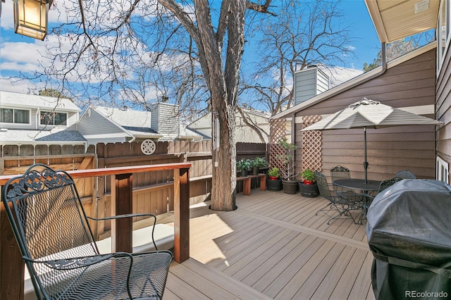 deck featuring fence and grilling area