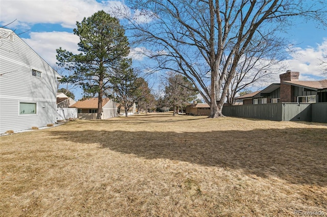 view of yard with fence