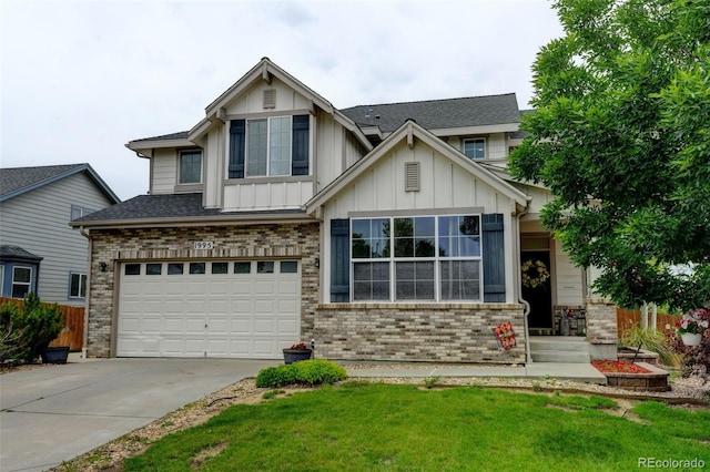 1995 E 166th Ave, Thornton, CO 80602 - view of front of home featuring board and batten siding, an attached garage, driveway, and brick siding