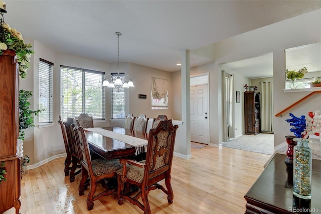1995 E 166th Ave, Thornton, CO 80602 - dining room with recessed lighting, a chandelier, light wood finished floors, and baseboards