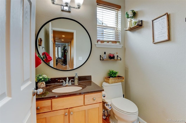 1995 E 166th Ave, Thornton, CO 80602 - half bath featuring vanity and toilet