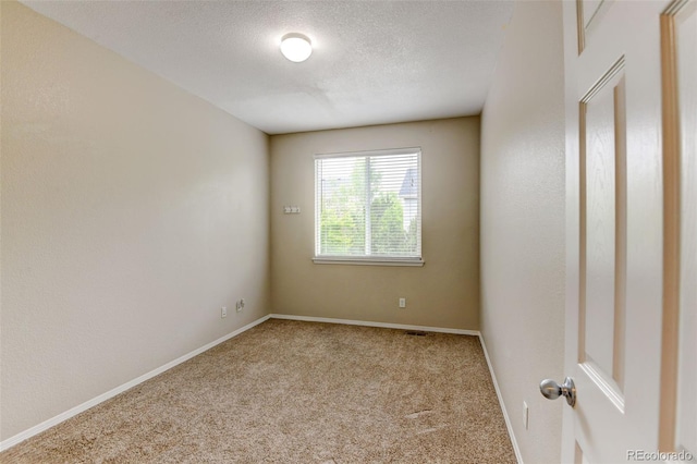 1995 E 166th Ave, Thornton, CO 80602 - carpeted spare room with baseboards and a textured ceiling
