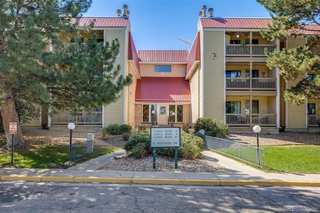 view of property with fence