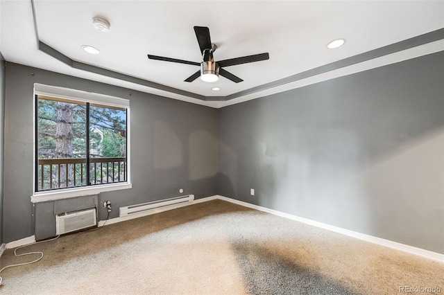 carpeted empty room featuring baseboards, a ceiling fan, a baseboard radiator, a wall mounted AC, and recessed lighting