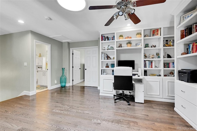 home office featuring baseboards, ceiling fan, recessed lighting, and wood finished floors
