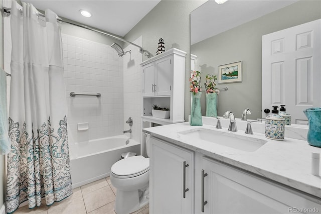 bathroom featuring tile patterned flooring, shower / tub combo with curtain, toilet, and vanity