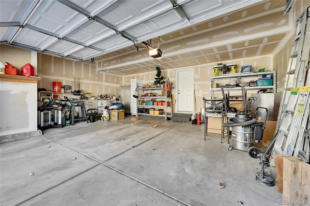 garage featuring a garage door opener