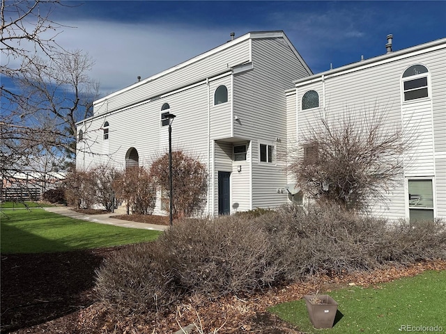 exterior space with a front yard