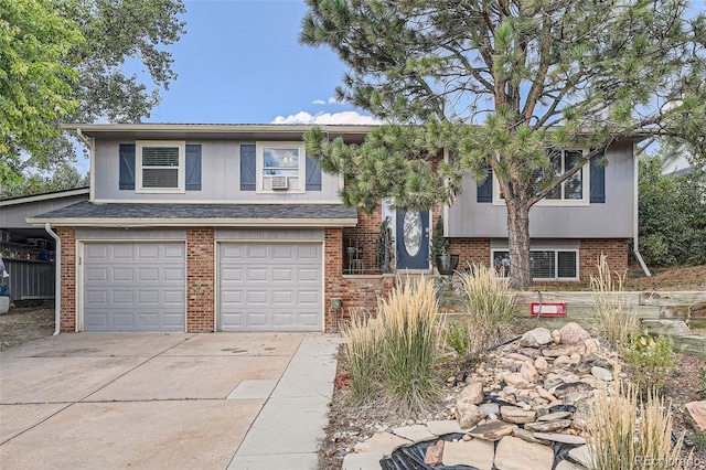 raised ranch featuring a garage