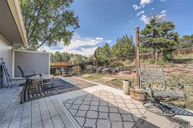 view of patio / terrace featuring a wooden deck