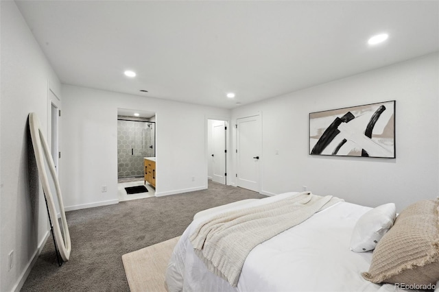 carpeted bedroom featuring recessed lighting, baseboards, and ensuite bath
