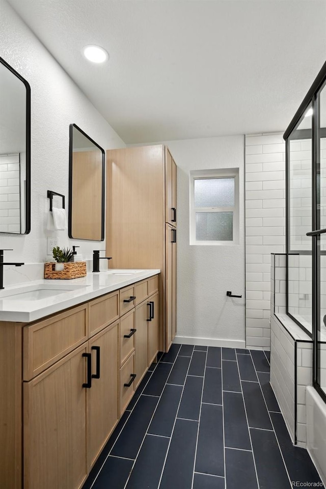 full bathroom with tile patterned floors, double vanity, a tub, a shower, and recessed lighting