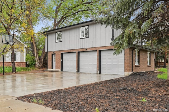 garage featuring driveway
