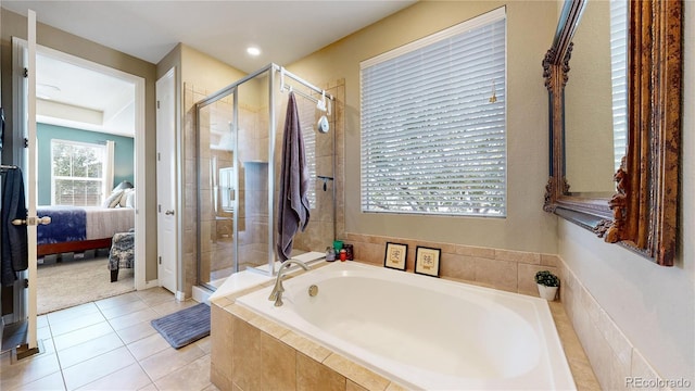 full bath with a bath, tile patterned flooring, a shower stall, and connected bathroom