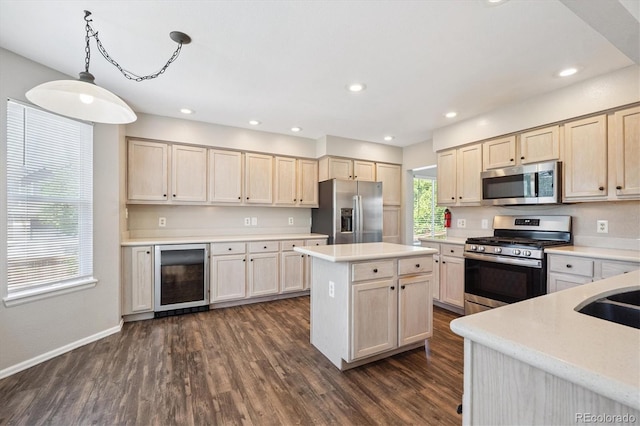 9823 Salford Ln, Highlands Ranch, CO 80126 - kitchen featuring stainless steel appliances, wine cooler, dark wood-style flooring, a kitchen island, and recessed lighting