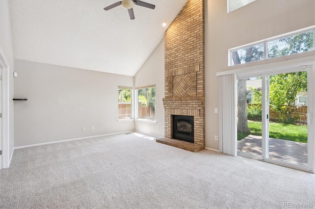 9823 Salford Ln, Highlands Ranch, CO 80126 - unfurnished living room with high vaulted ceiling, a ceiling fan, carpet, and a fireplace