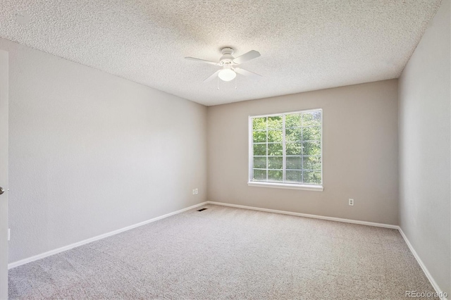 9823 Salford Ln, Highlands Ranch, CO 80126 - carpeted empty room with a ceiling fan and a textured ceiling