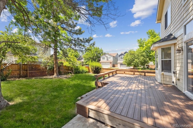 9823 Salford Ln, Highlands Ranch, CO 80126 - wooden deck featuring a fenced backyard and a residential view