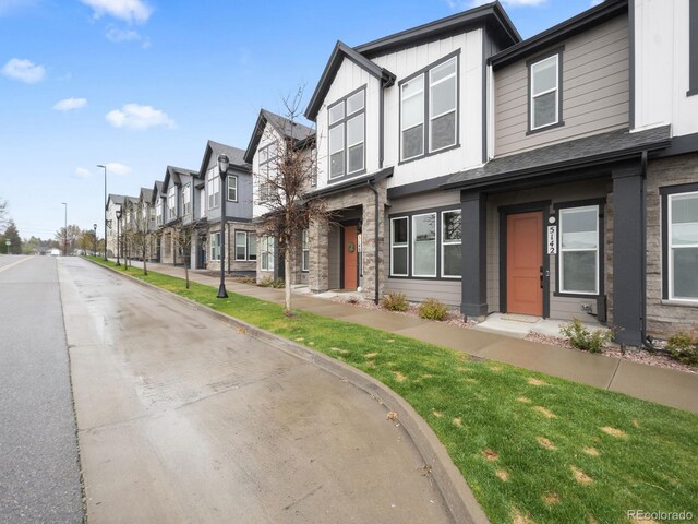view of front of house with a residential view