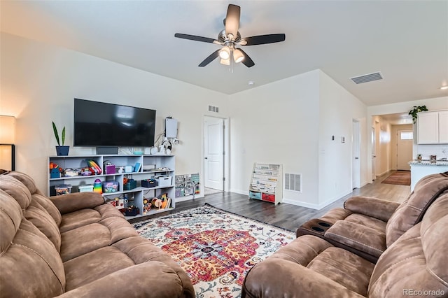 235 Yellowtail St, Bennett, CO 80102 - living room with visible vents, a ceiling fan, and wood finished floors