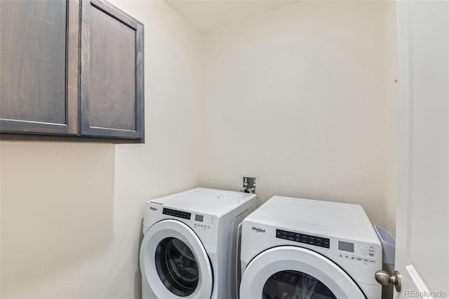 235 Yellowtail St, Bennett, CO 80102 - laundry room with cabinet space and washer and dryer