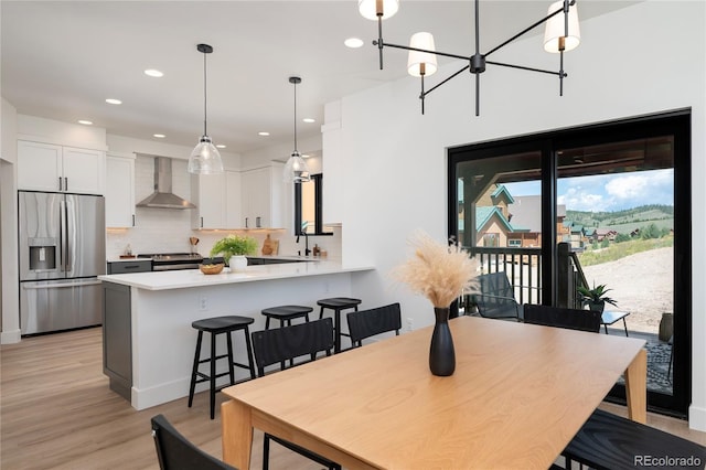 2101 Lupine Ln, Tabernash, CO 80478 - dining room with recessed lighting, light wood-type flooring, and a chandelier