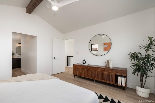 2101 Lupine Ln, Tabernash, CO 80478 - bedroom with beam ceiling, light wood finished floors, high vaulted ceiling, ensuite bath, and baseboards