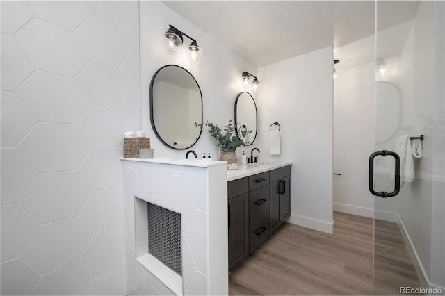 2101 Lupine Ln, Tabernash, CO 80478 - full bath with double vanity, wood finished floors, and baseboards