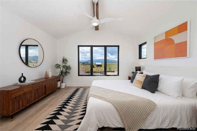 2101 Lupine Ln, Tabernash, CO 80478 - bedroom with light wood finished floors, vaulted ceiling, ceiling fan, and baseboards