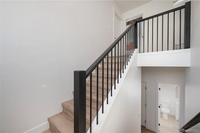 2101 Lupine Ln, Tabernash, CO 80478 - stairway featuring baseboards and wood finished floors