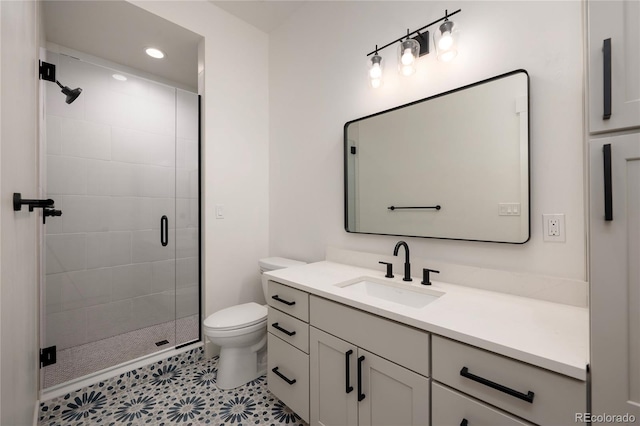 2101 Lupine Ln, Tabernash, CO 80478 - full bath featuring vanity, toilet, a shower stall, and recessed lighting