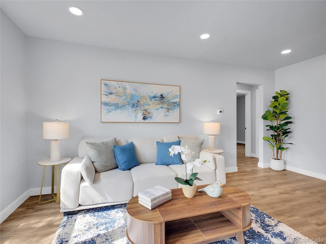 5152 Bryant St, Denver, CO 80221 - living room featuring baseboards, light wood-style floors, and recessed lighting