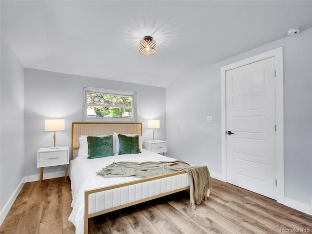 5152 Bryant St, Denver, CO 80221 - bedroom featuring wood finished floors and baseboards
