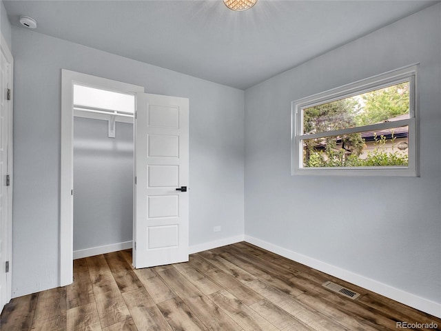 5152 Bryant St, Denver, CO 80221 - unfurnished bedroom featuring wood finished floors, baseboards, and a closet