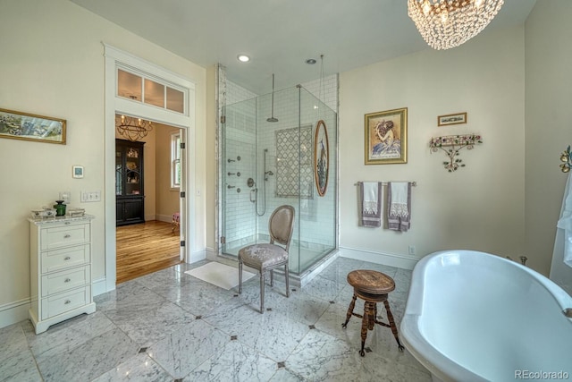 16202 County Road 327, Buena Vista, CO 81211 - full bath featuring a shower stall, a chandelier, a freestanding bath, and recessed lighting