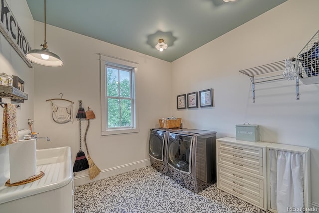 16202 County Road 327, Buena Vista, CO 81211 - laundry area with washing machine and clothes dryer and baseboards
