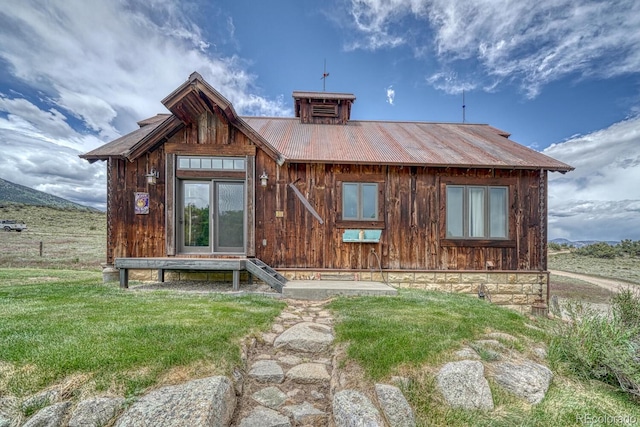 16202 County Road 327, Buena Vista, CO 81211 - view of front of house with a metal roof and board and batten siding