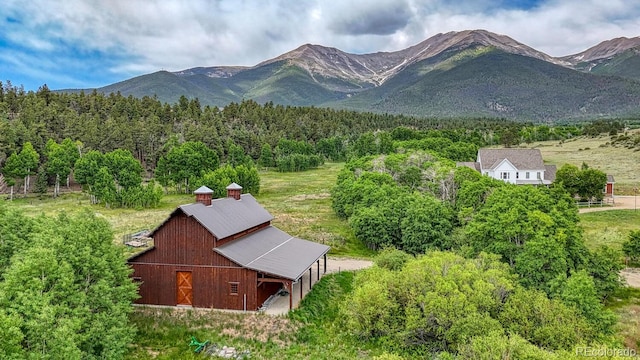 16202 County Road 327, Buena Vista, CO 81211 - view of mountain backdrop featuring a heavily wooded area