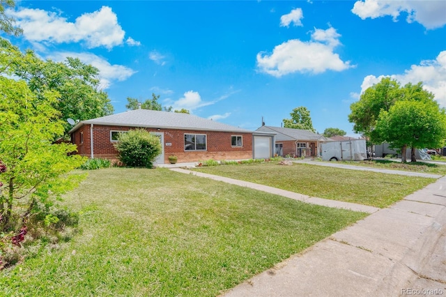 9320 Fir Dr, Thornton, CO 80229 - single story home featuring brick siding, driveway, an attached garage, and a front yard
