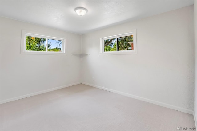 9320 Fir Dr, Thornton, CO 80229 - carpeted empty room with plenty of natural light