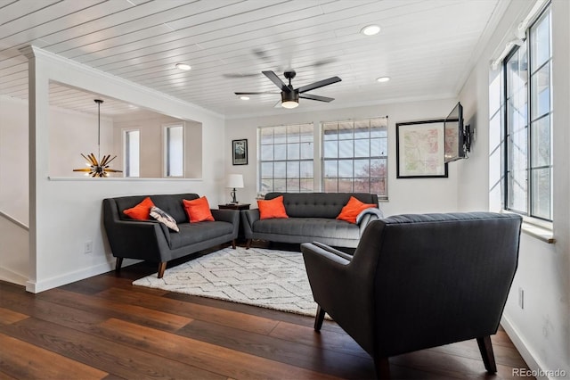 13472 W Dakota Ave, Lakewood, CO 80228 - living area featuring a healthy amount of sunlight, baseboards, and hardwood / wood-style flooring