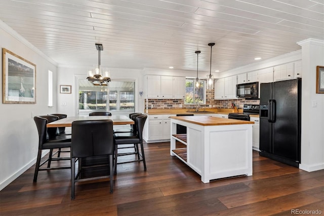 13472 W Dakota Ave, Lakewood, CO 80228 - kitchen with white cabinetry, wooden counters, a sink, and black appliances