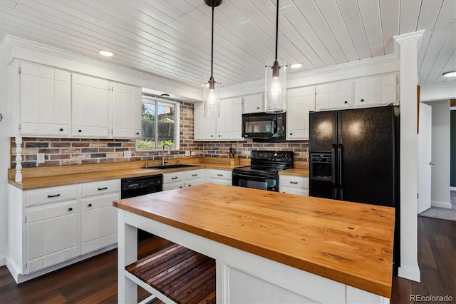 13472 W Dakota Ave, Lakewood, CO 80228 - kitchen with ornamental molding, wooden counters, white cabinetry, a sink, and black appliances