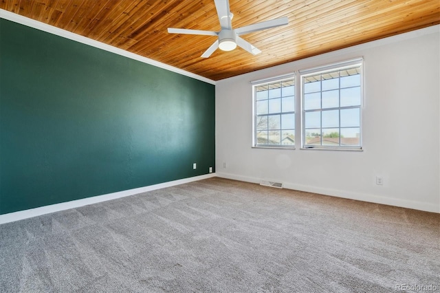 13472 W Dakota Ave, Lakewood, CO 80228 - carpeted spare room with crown molding, ceiling fan, baseboards, wooden ceiling, and visible vents