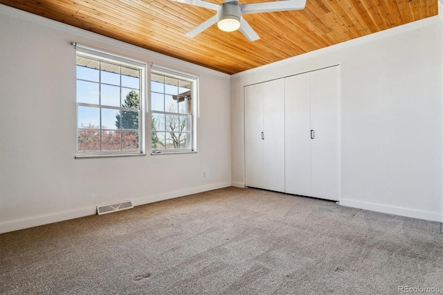 13472 W Dakota Ave, Lakewood, CO 80228 - unfurnished bedroom featuring carpet floors, baseboards, visible vents, and wooden ceiling