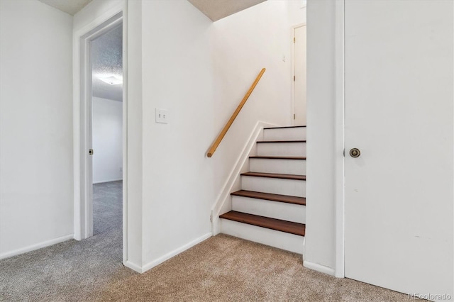13472 W Dakota Ave, Lakewood, CO 80228 - staircase featuring baseboards and carpet flooring