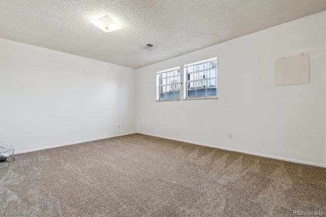 13472 W Dakota Ave, Lakewood, CO 80228 - carpeted empty room with a textured ceiling, visible vents, and baseboards