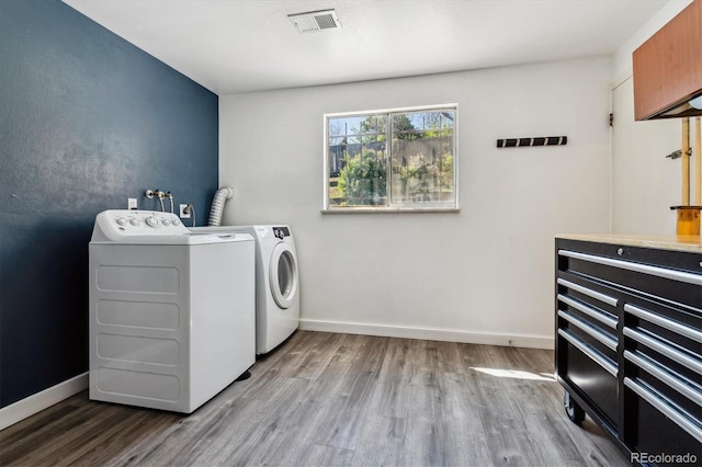 13472 W Dakota Ave, Lakewood, CO 80228 - laundry area featuring baseboards, laundry area, washer and clothes dryer, and wood finished floors