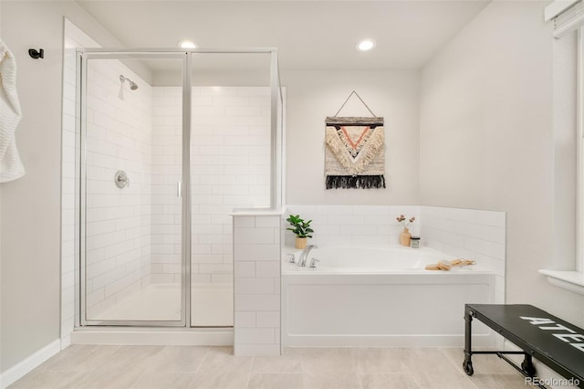 bathroom featuring tile patterned floors, a shower stall, recessed lighting, and a bath