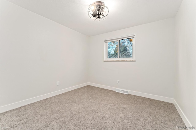 unfurnished room with carpet